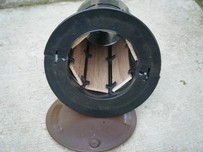 Bait box containing termite bait where termites are infesting a skirting board Bait box containing termite bait where termites are infesting a skirting board